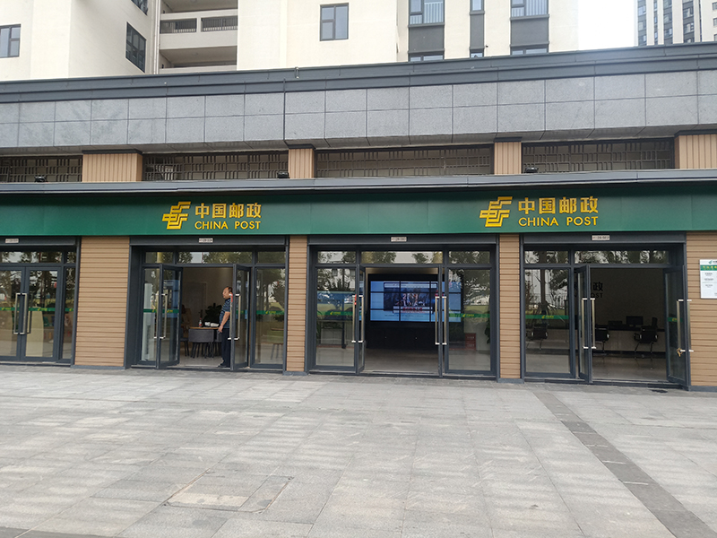 武汉军运村商业街项目中国邮政无边字招牌制作案例